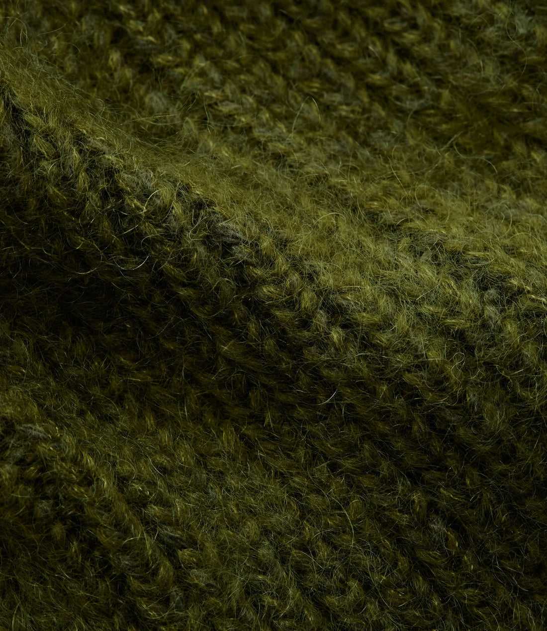 Close-up of the soft, hairy sage alpaca-mohair rib knit