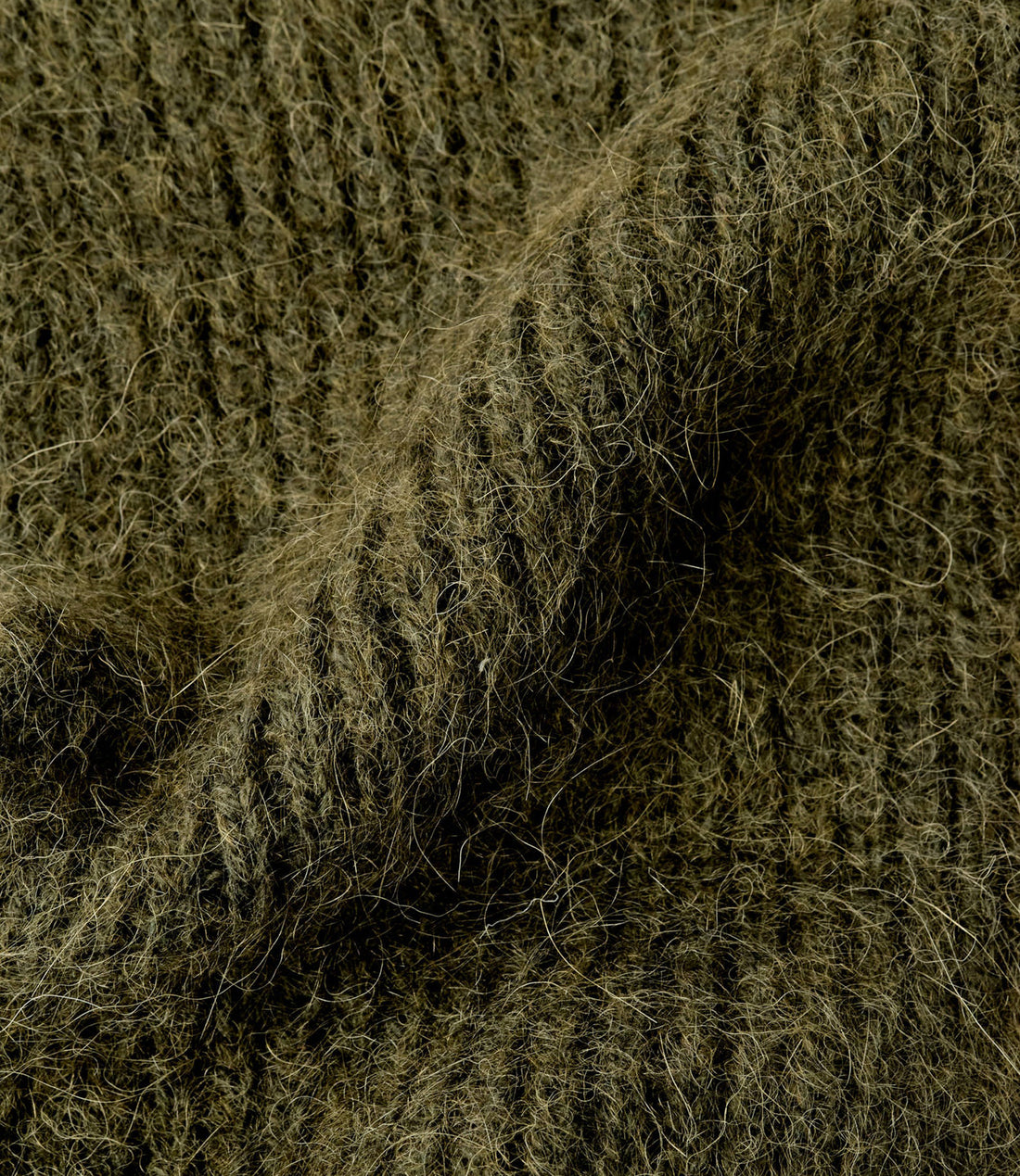 Close-up of the hairy sage alpaca knit