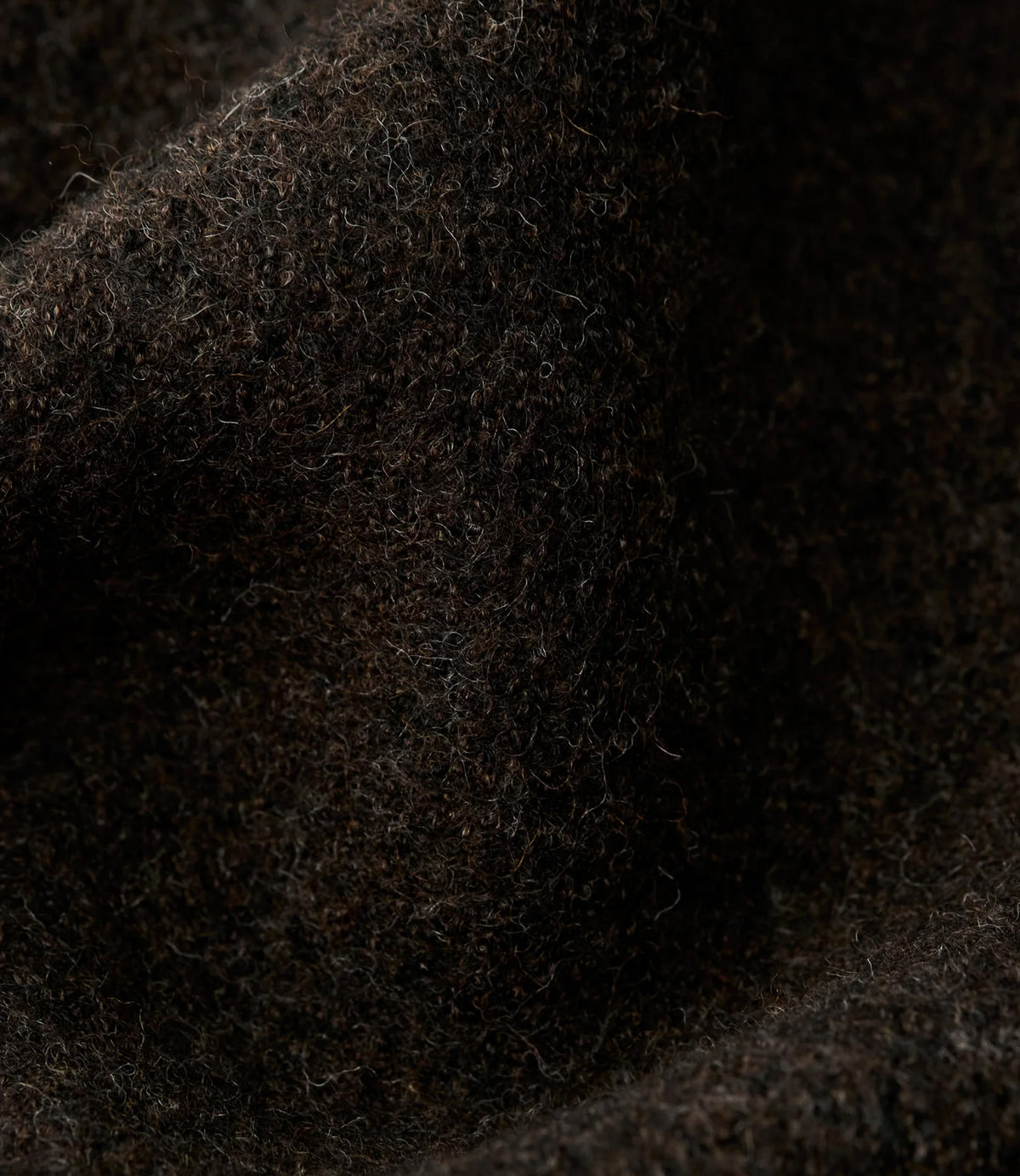 Close-up of the dark oak virgin wool loden