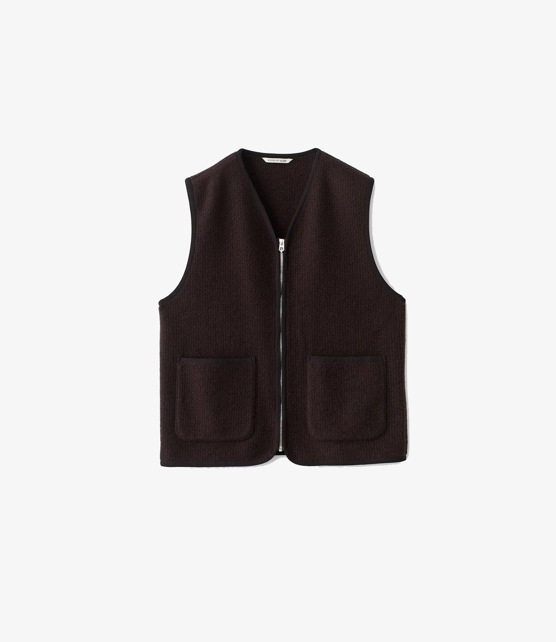 A Kind of Guise Valur Wool Vest in mahogany tiles with zip front and patch pockets, front view