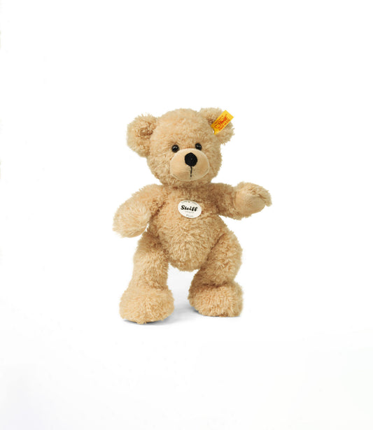 Steiff Fynn teddy bear in soft beige plush with Button in Ear, standing